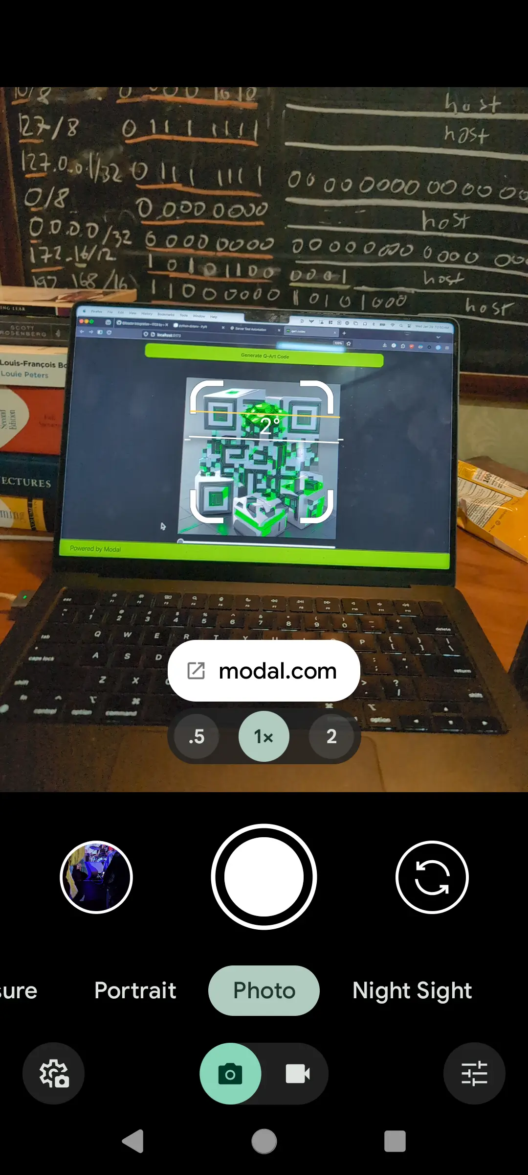 A screenshot of a mobile phone displaying a link decoded from a QArt code.